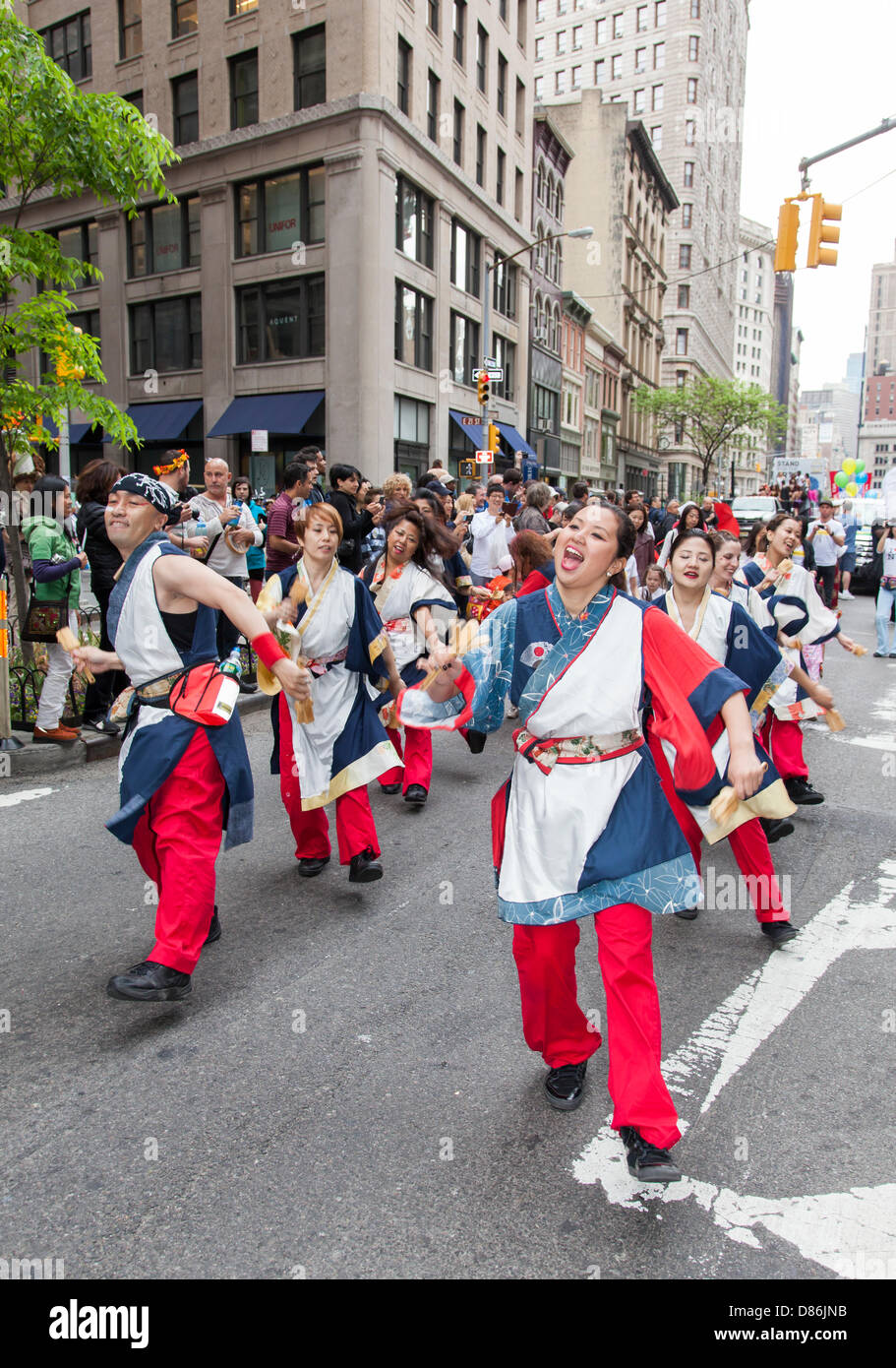 NEW YORK, USA - MAY 18, 2013: Members of Yosakoi Dance Project - 10tecomai dance on Broadway during 7th Dance Parade of New York Stock Photo