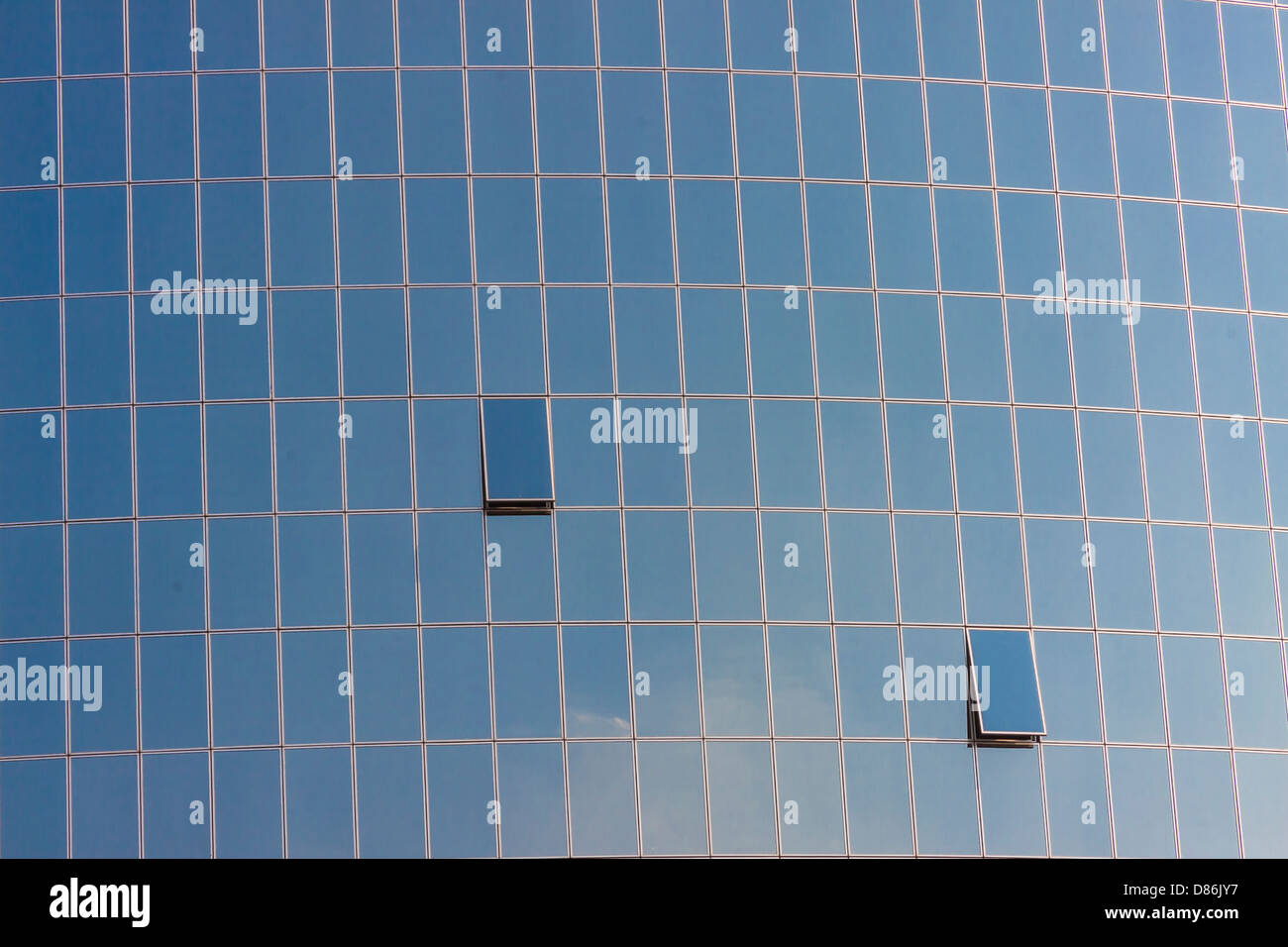 Glasses wall with two open windows of expensive and exclusive hotel in