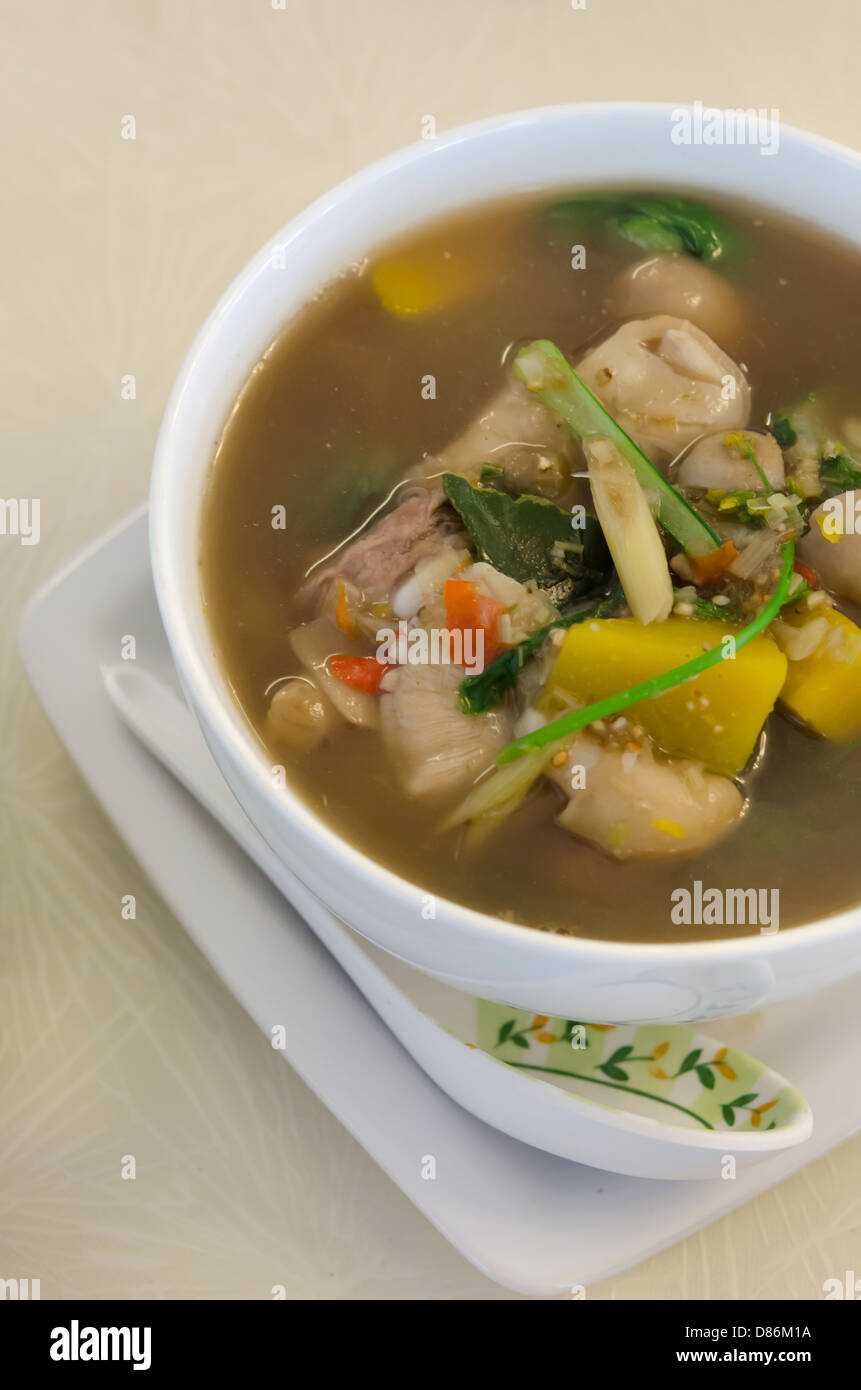 top view spicy soup made from pork , spices and vegetables , asian food