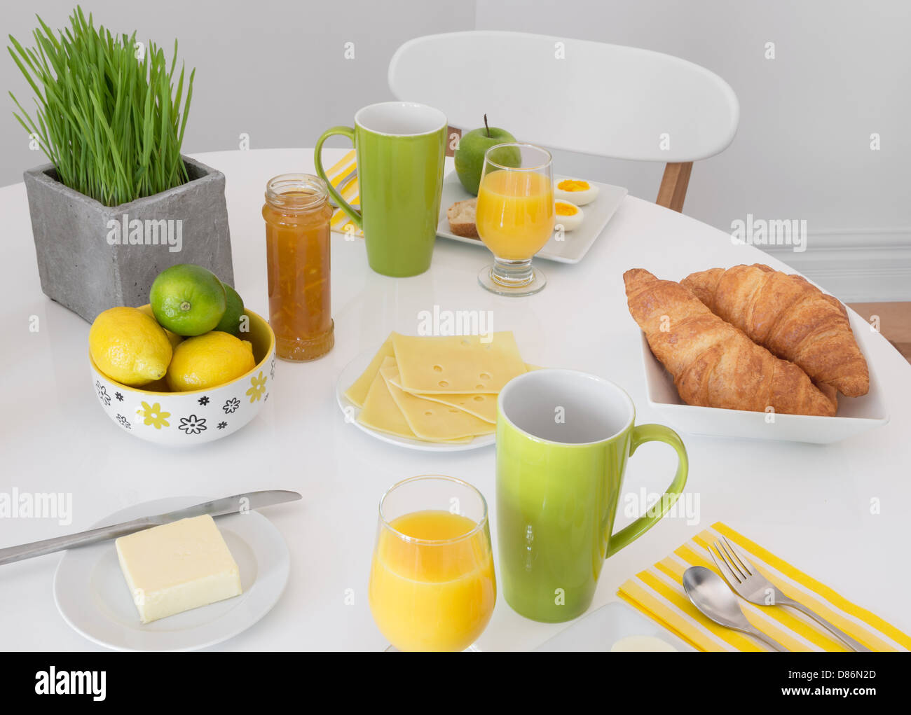 Bright table setting with tasty and healthy breakfast Stock Photo - Alamy