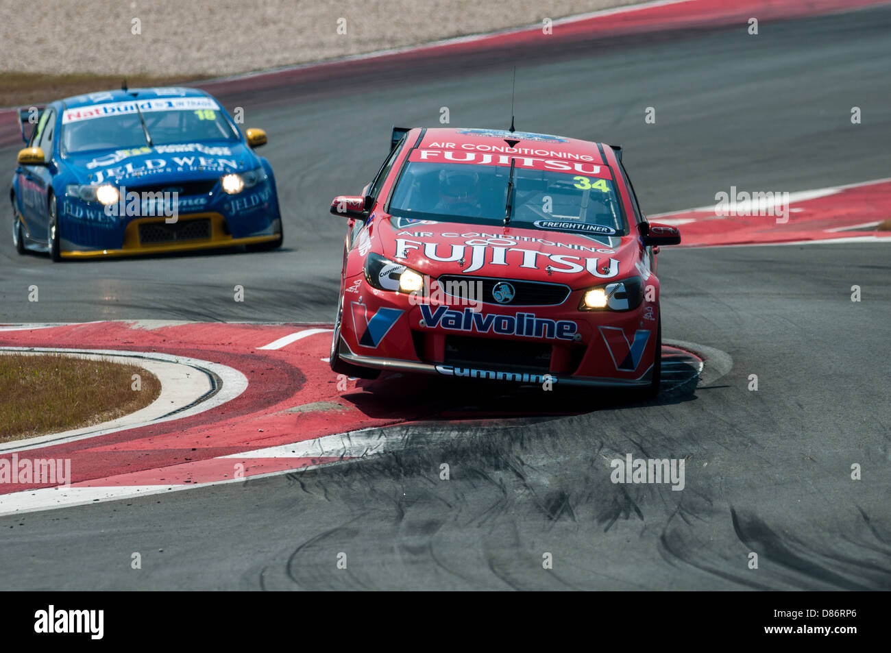 Alexandre Premat catches some air during V8 Supercars racing at Circuit of the Americas on May 18th, 2013 Stock Photo