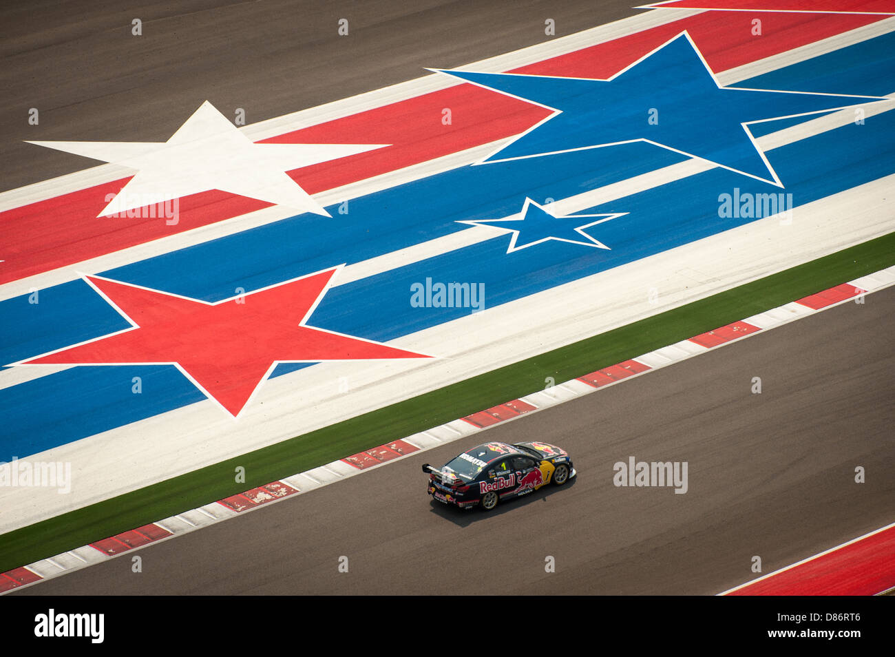 Jamie Whincup of Red Bull heading for victory in the first 2013 V8 Supercars 'Austin 400' race at Circuit of the Americas. Stock Photo