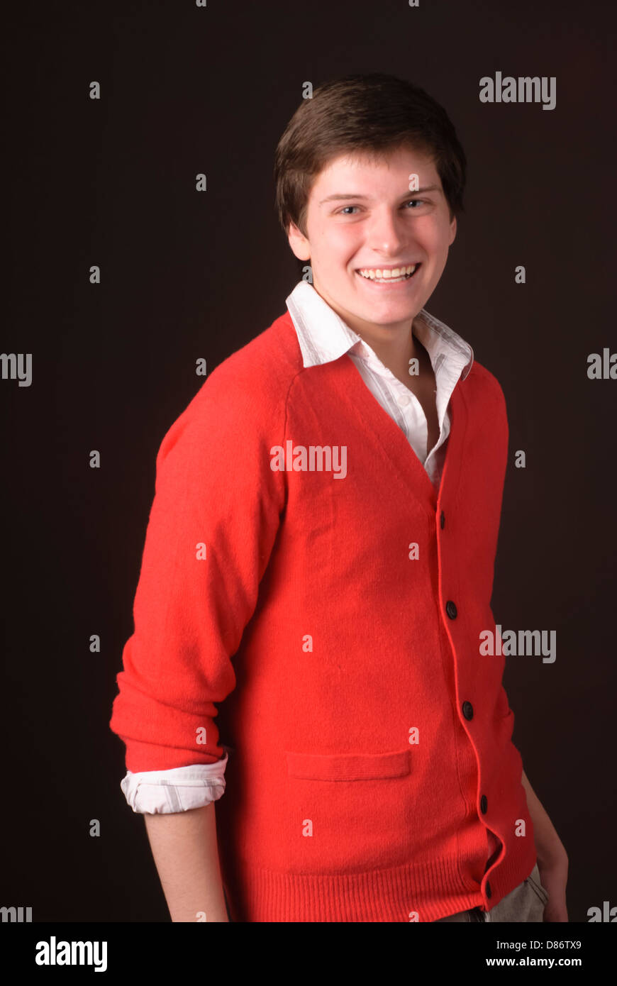 Young man posing and cutting up in studio environment Stock Photo Alamy