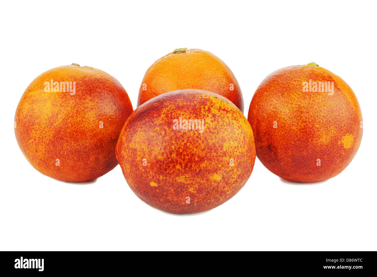 Ripe red blood oranges isolated on white background. Stock Photo