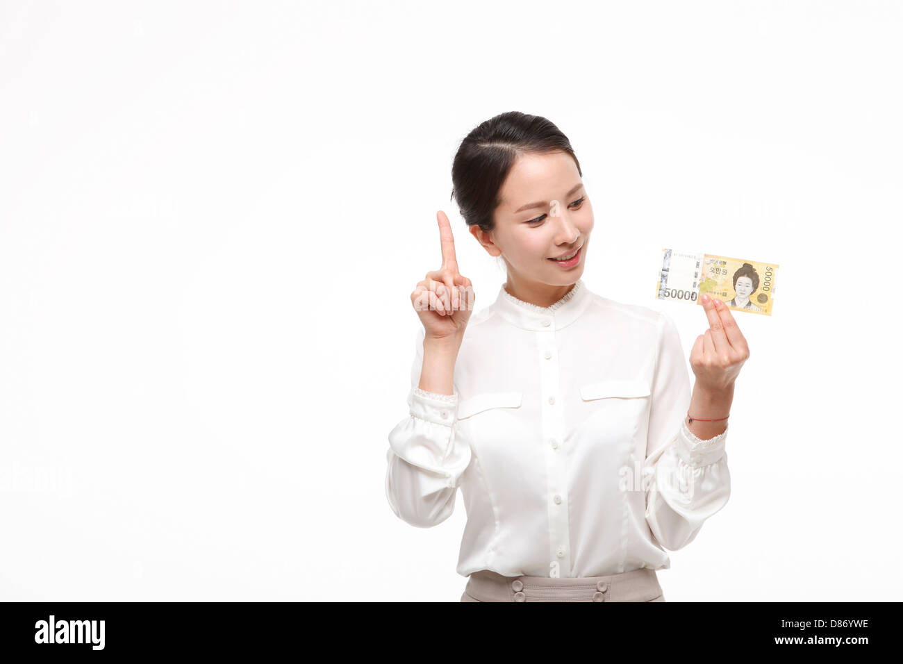 young woman posing paper money. Stock Photo