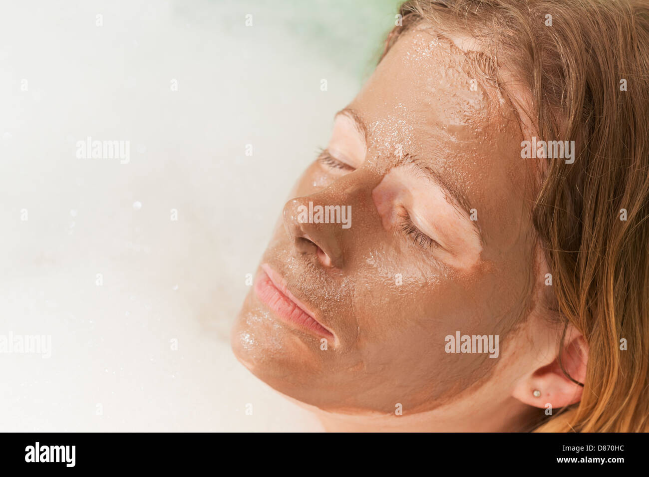 Woman brown mask mud hi-res stock photography and images - Alamy