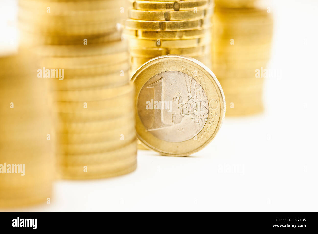 Stack of Euro cent coins with One Cent coin, close up Stock Photo