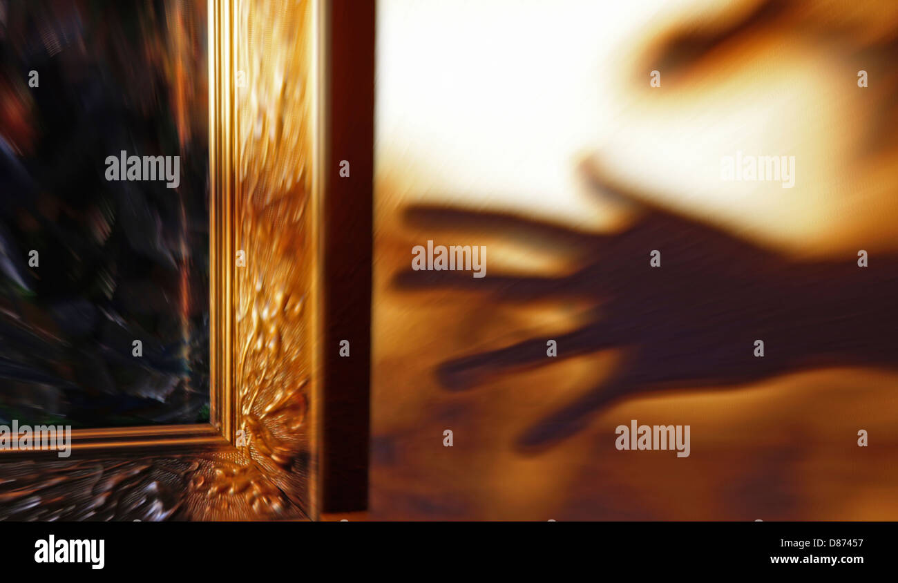 Shadow of hand stealing piece of art Stock Photo Alamy