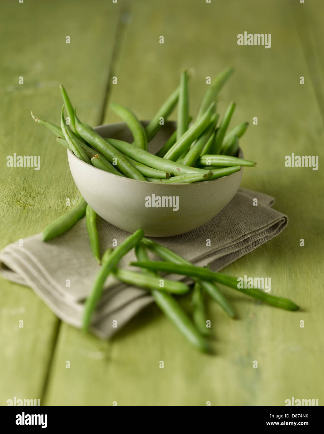 Bowl Of Green Beans On Wooden Table Close Up Stock Photo Alamy