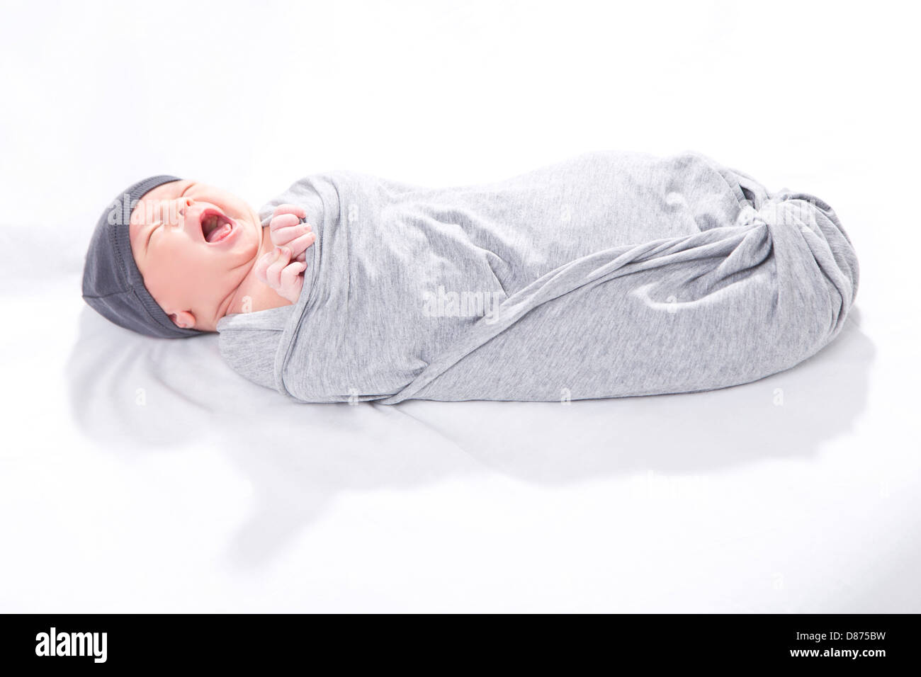 Baby Wrapped In Blanket Stock Photo - Alamy