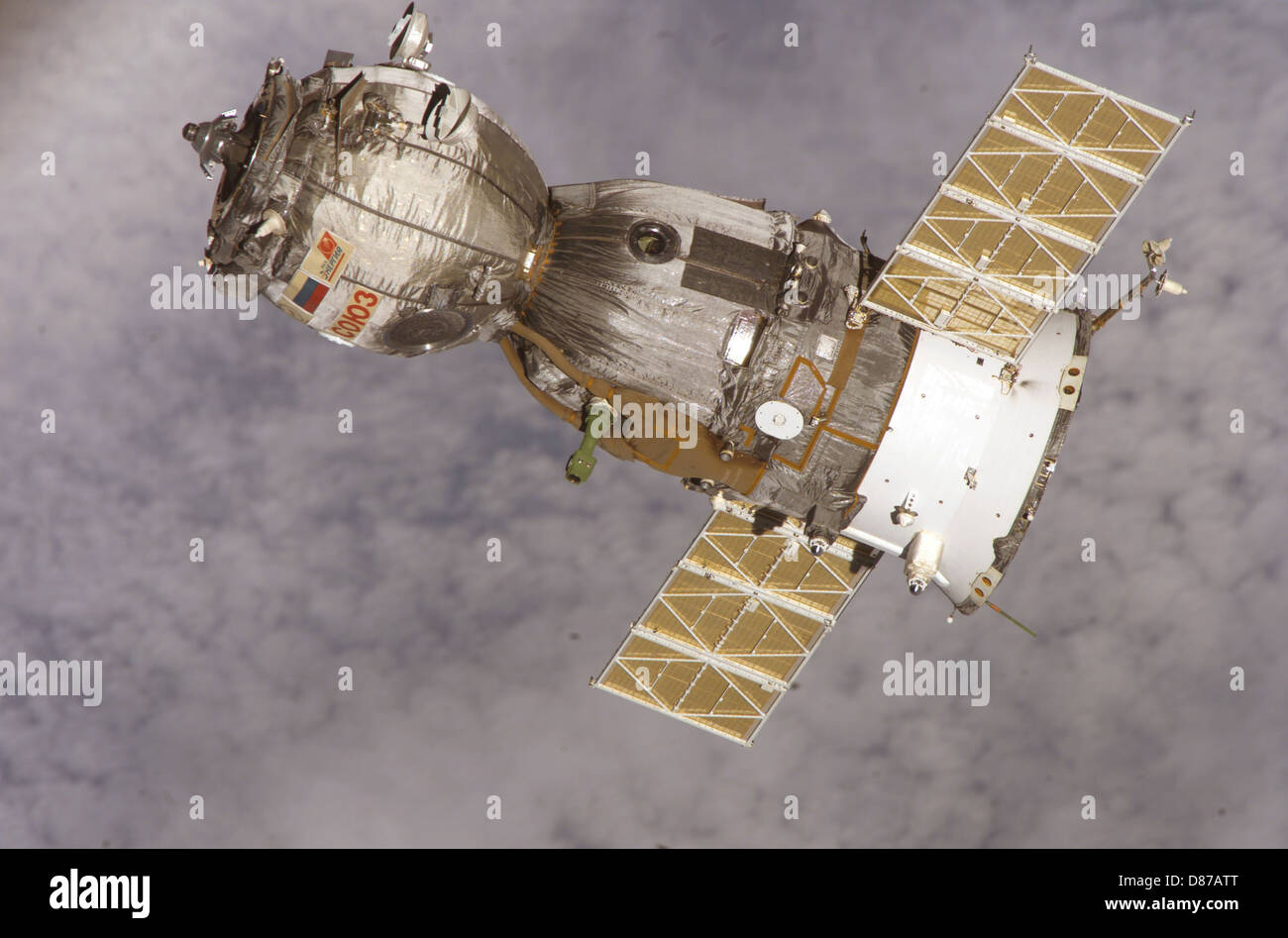 The Soyuz TMA-7 spacecraft, part of the Russian Soyuz program, is shown in this image as it heads toward the International Space Station (ISS) for crew transport and cargo delivery. Soyuz missions are crucial for maintaining crew presence aboard the ISS and supporting space station operations. Stock Photo
