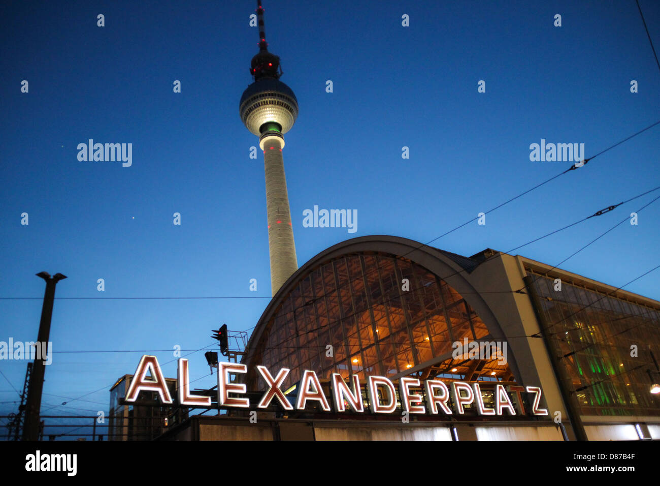 TV tower in Berlin 'Berliner Fernsehturm' view from Alexanderplatz Square, overlooking the illuminated text Stock Photo