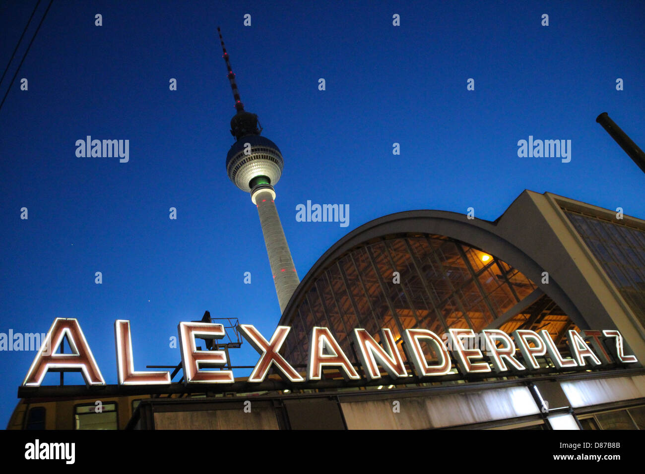 TV tower in Berlin 'Berliner Fernsehturm' view from Alexanderplatz Square, overlooking the illuminated text Stock Photo