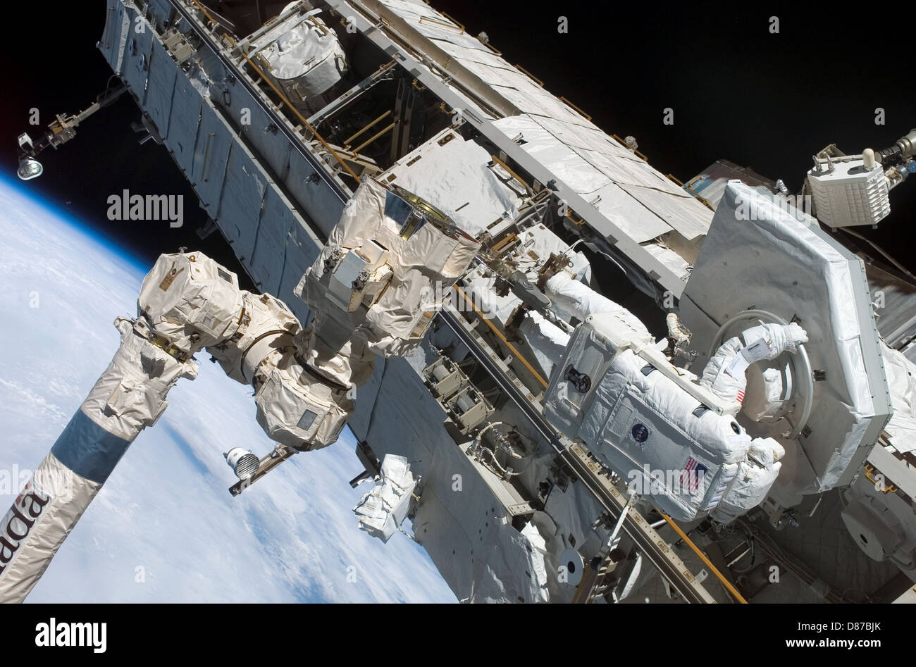 STS-121 Michael Fossum working on Mobile Transporter.jpg Stock Photo