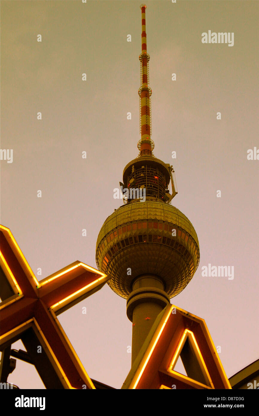 TV tower in Berlin 'Berliner Fernsehturm' view from Alexanderplatz Square, overlooking the illuminated text Stock Photo