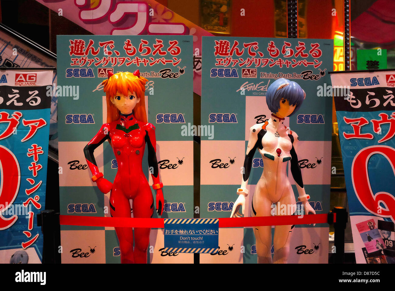 Evangelion display figures in front of an amusement arcade in Akihabara Stock Photo