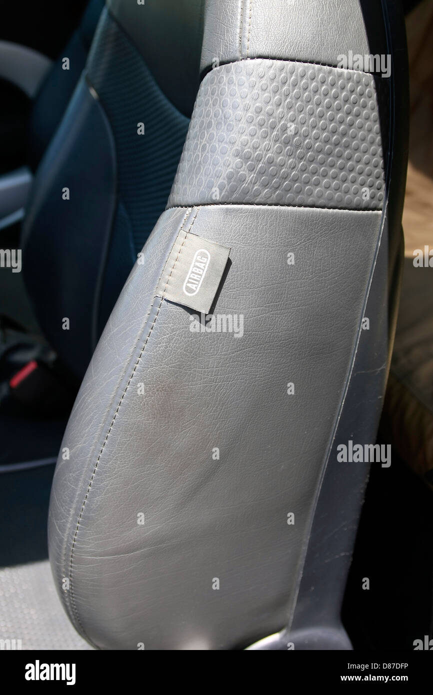 The side airbag label and seat of a modern BMW Mini Cooper Stock Photo