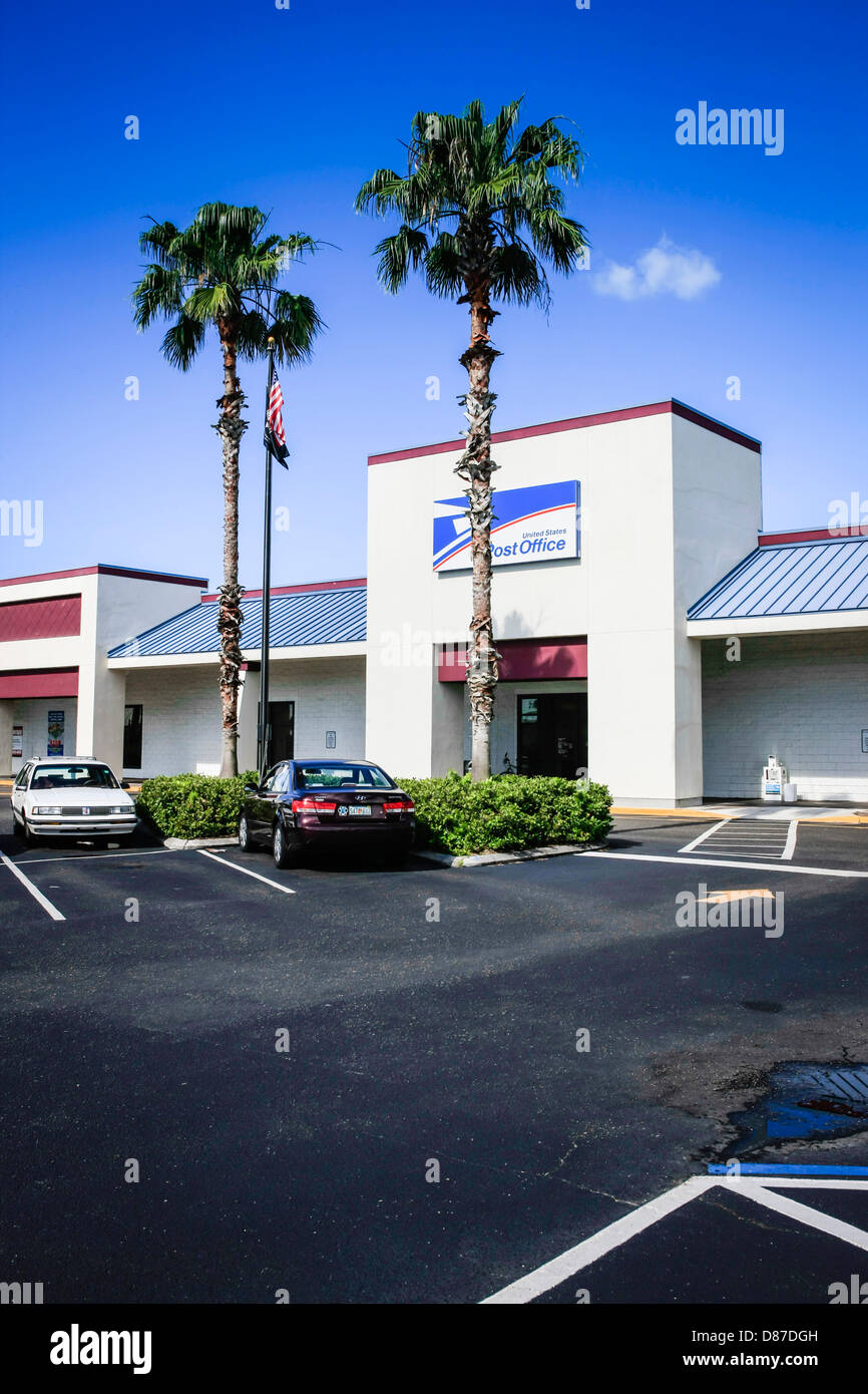 A US Postal Service building in a strip mall in Sarasota FL Stock Photo