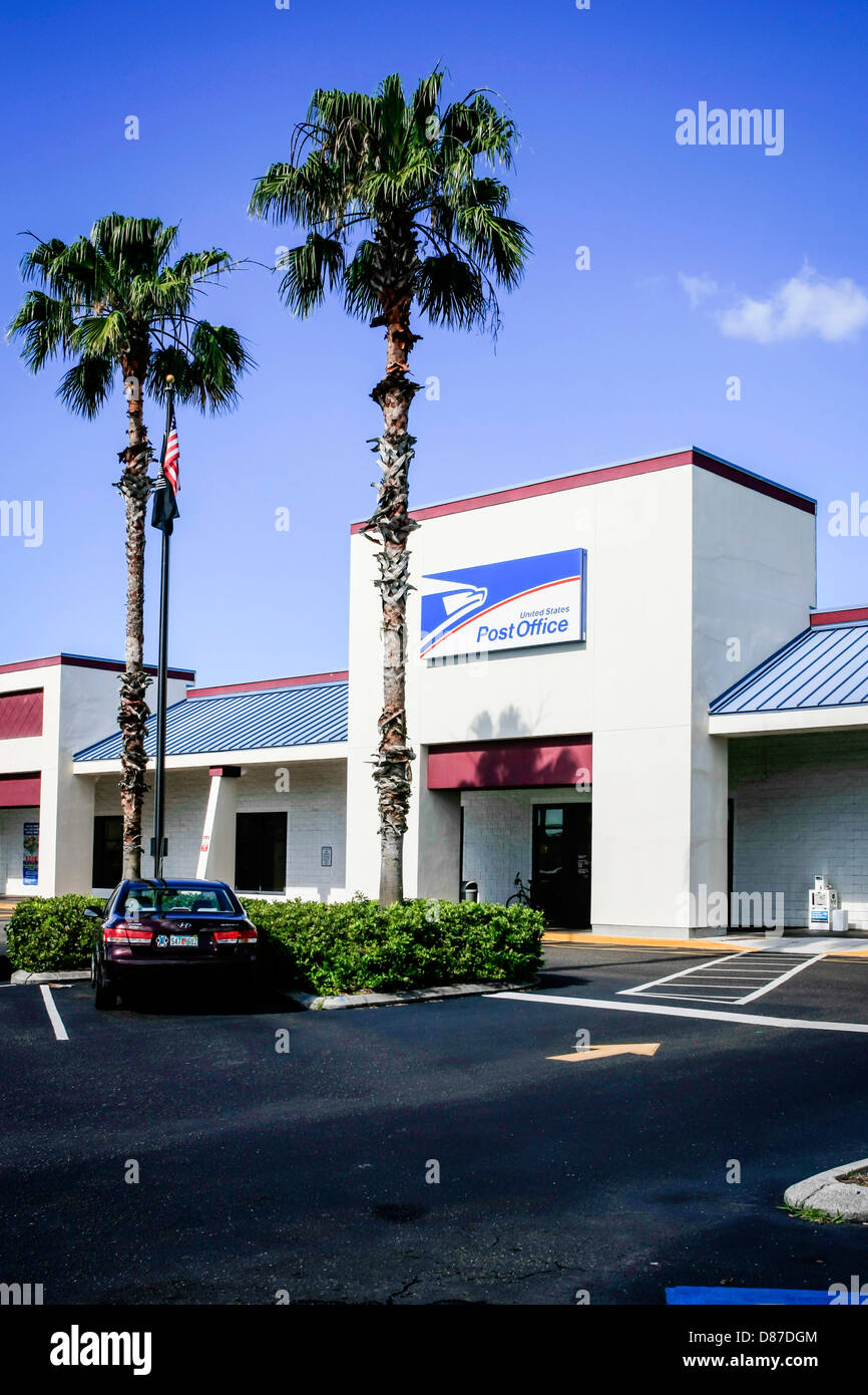 A US Postal Service building in a strip mall in Sarasota FL Stock Photo