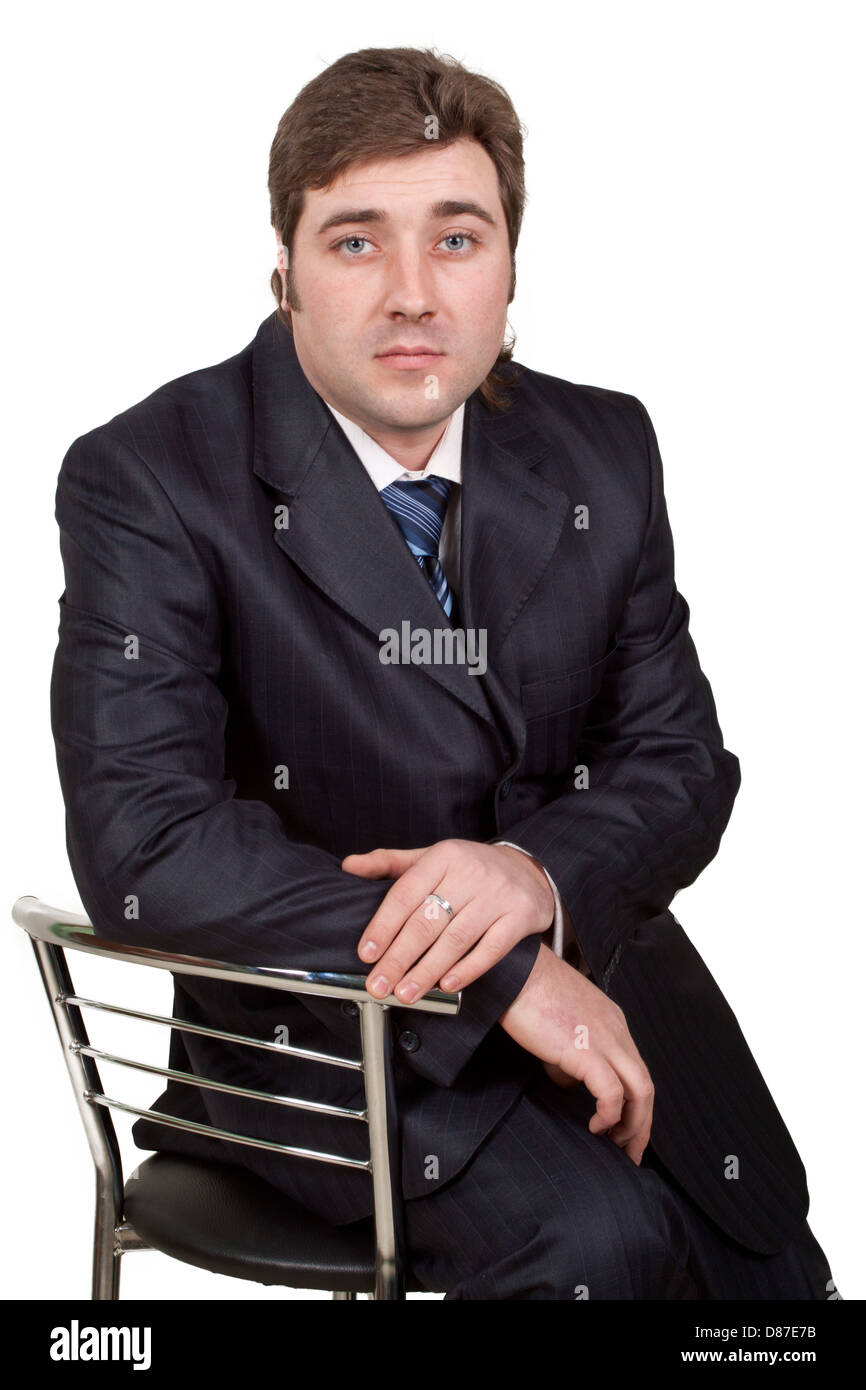 Young businessman posing in a suit isolated in white Stock Photo - Alamy