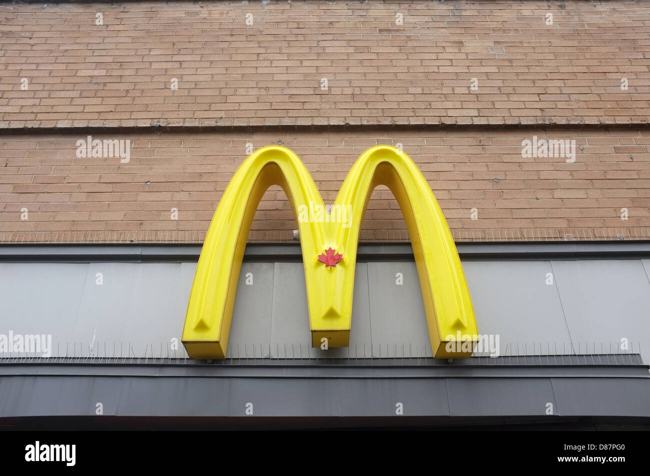 McDonald's Iconic golden arches company logo . Stock Photo