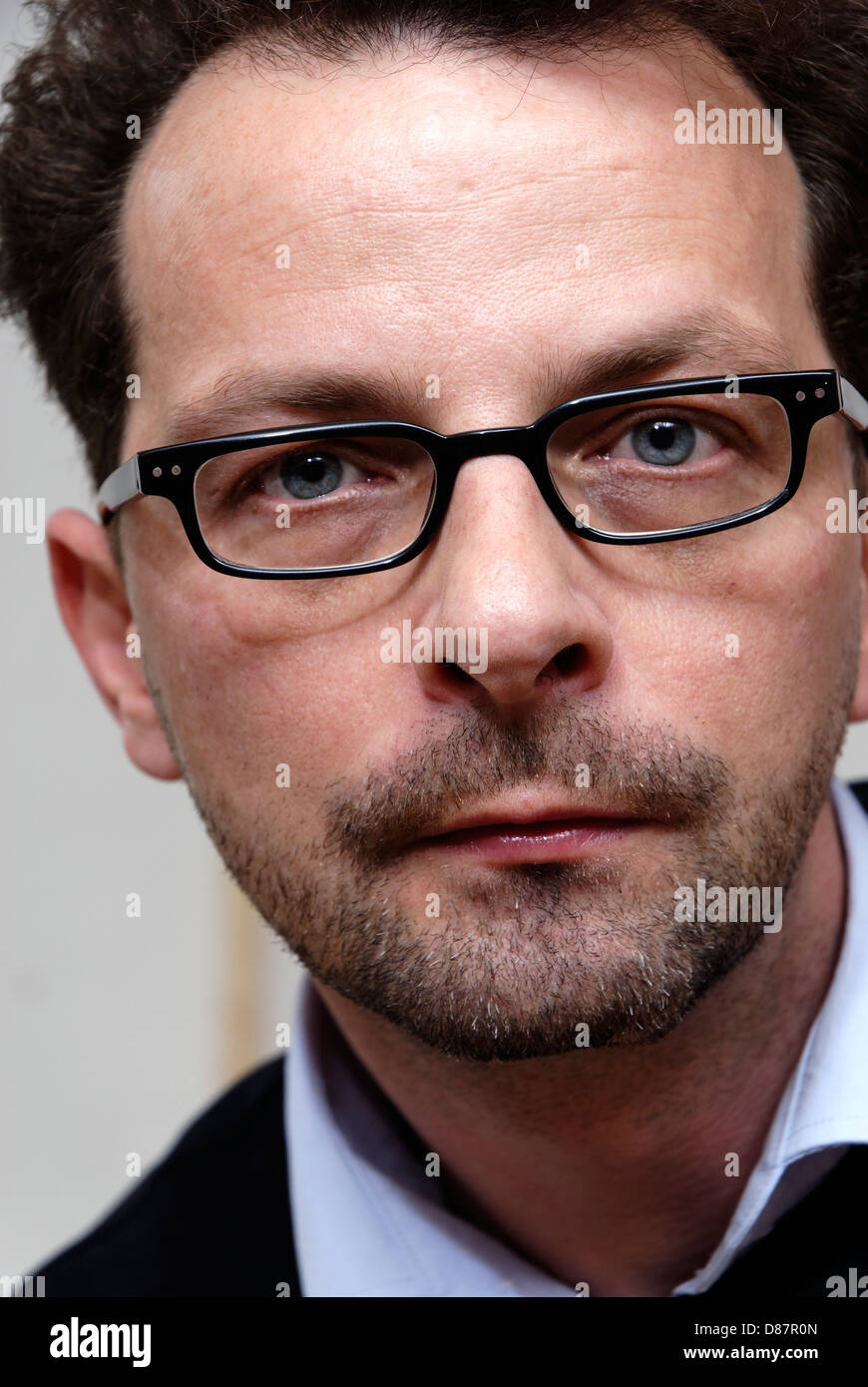 Man 40 glasses unshaved hi-res stock photography and images - Alamy