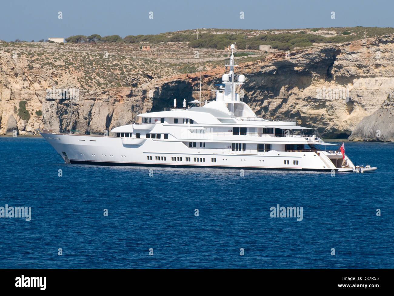 The Superyacht Hampshire II is moored  off the island of Comino, Malta. She was built in the Netherlands ans is 78.5 m long Stock Photo