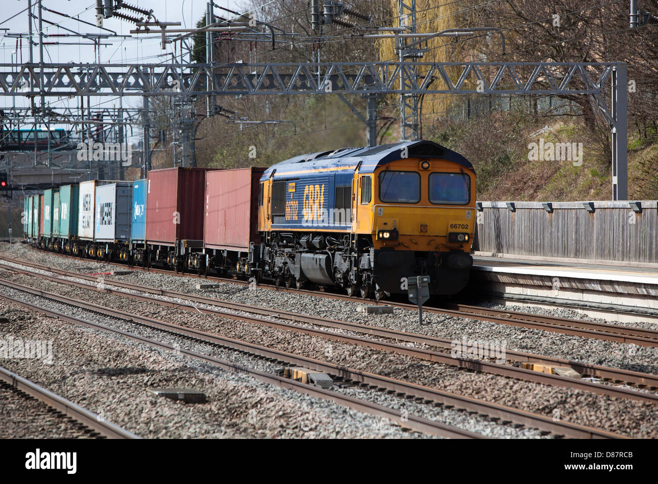 Freight train passing through Tamworth station on the West Coast Main ...