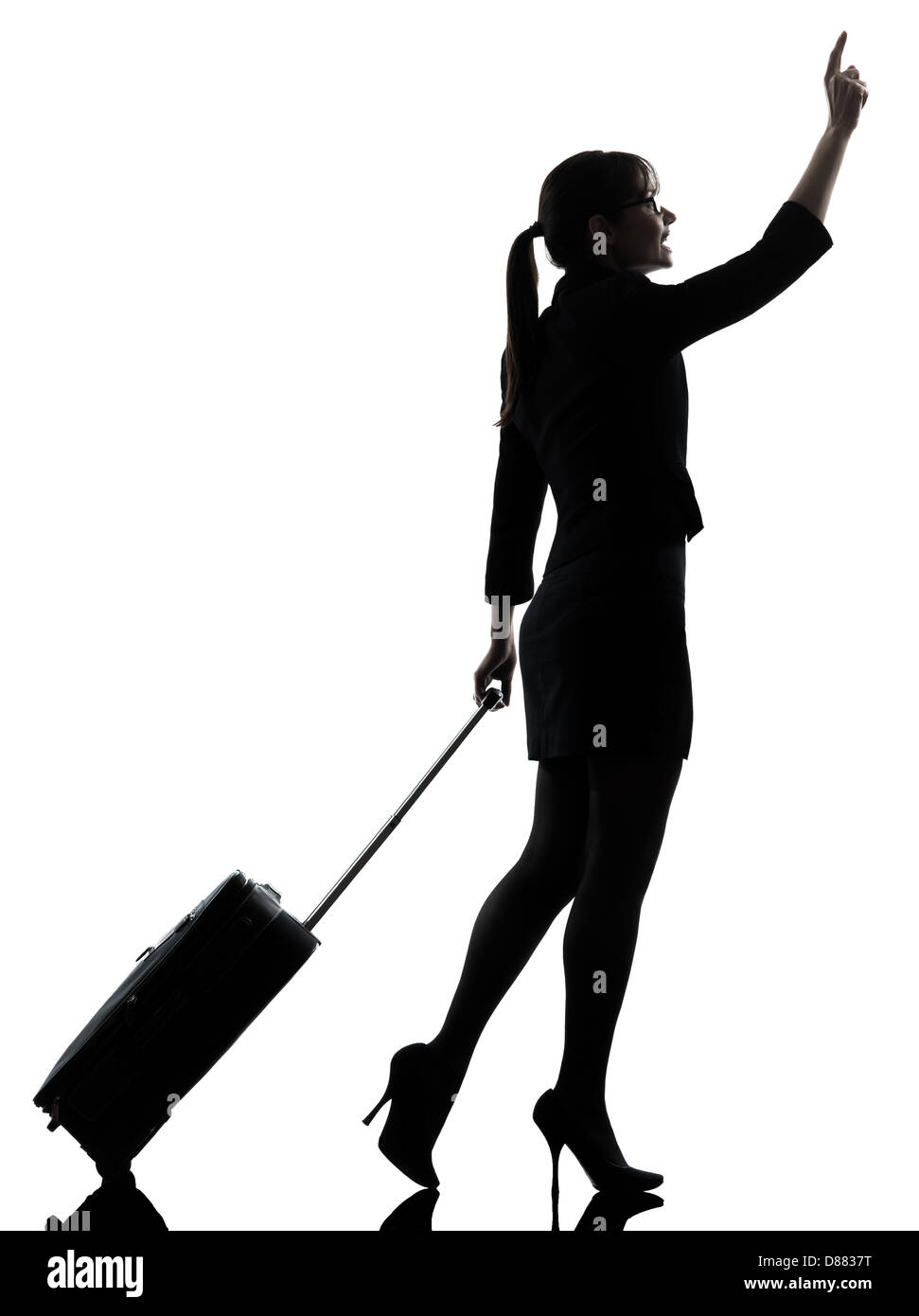 one business woman traveler walking hailing silhouette studio isolated on white background Stock Photo