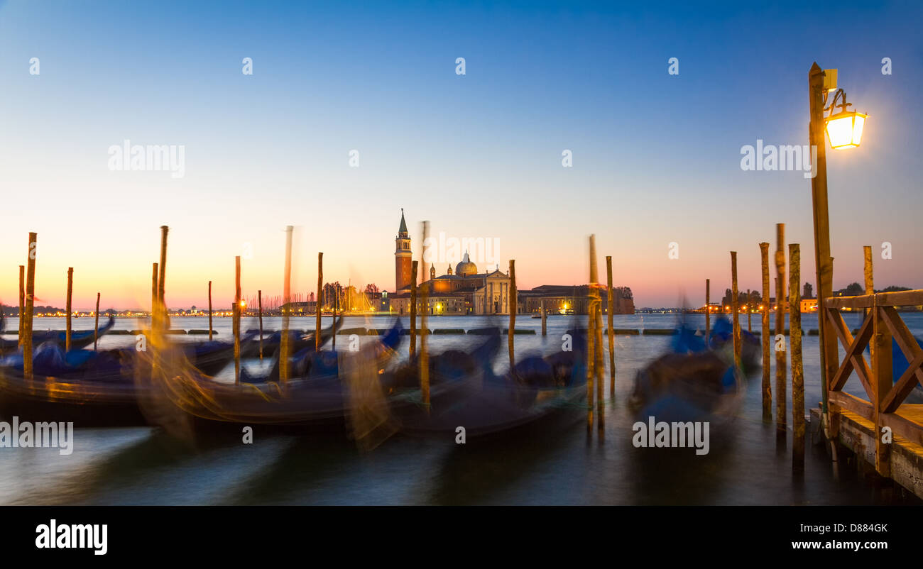 Gondolas at sunrise with San Giorgio di Maggiore church, Venice, Venezia, Italy Stock Photo