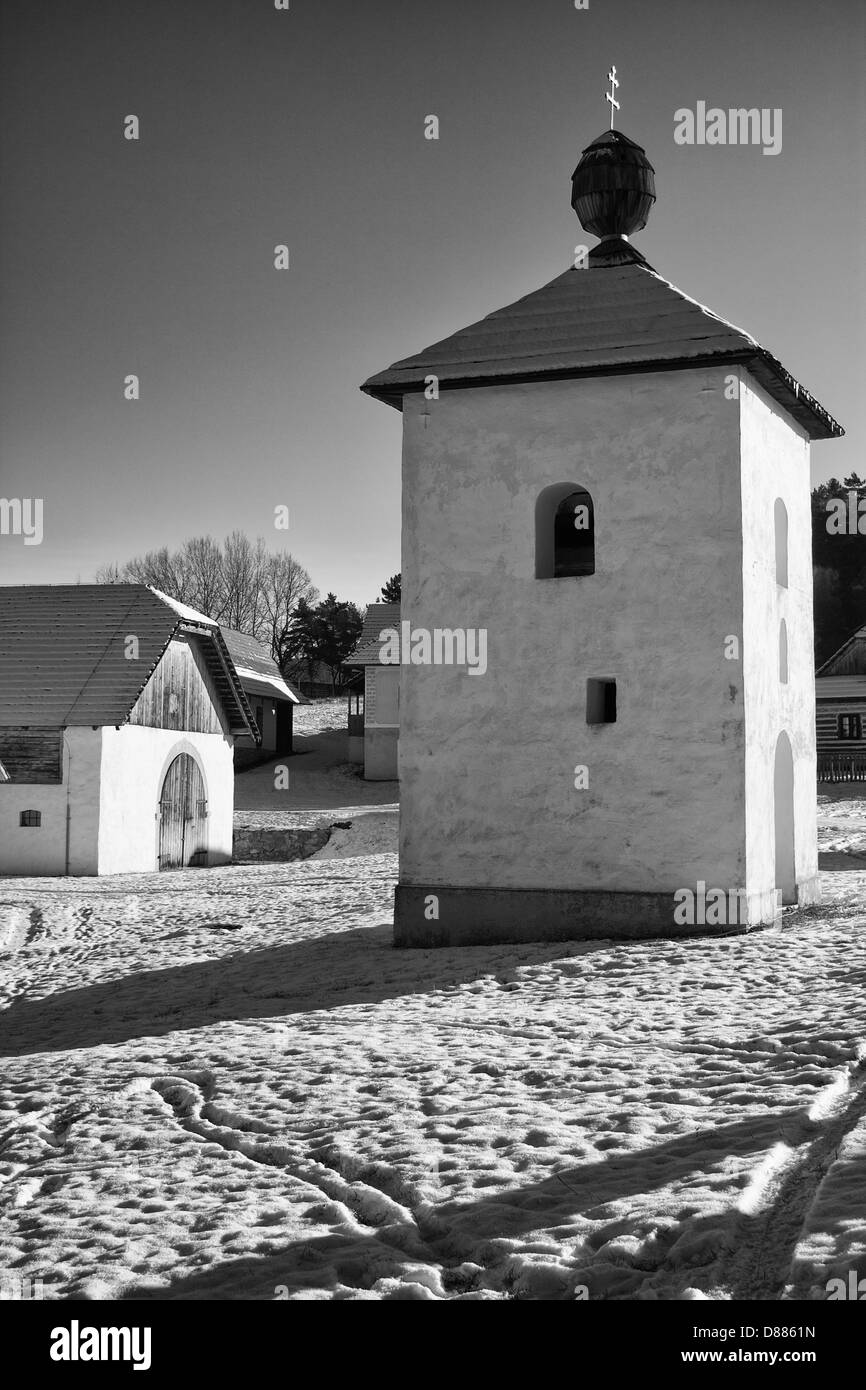 Old belfry in open-air museum through the winter Stock Photo
