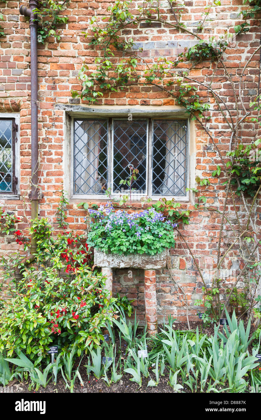 Sissinghurst Castle, Kent, England crumbling brickwork wall, leaded