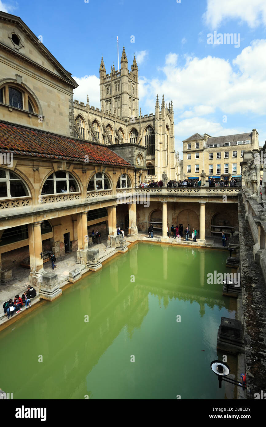 The Roman baths in Bath, Somerset, England, with the spires of Bath Abbey beyond. Stock Photo