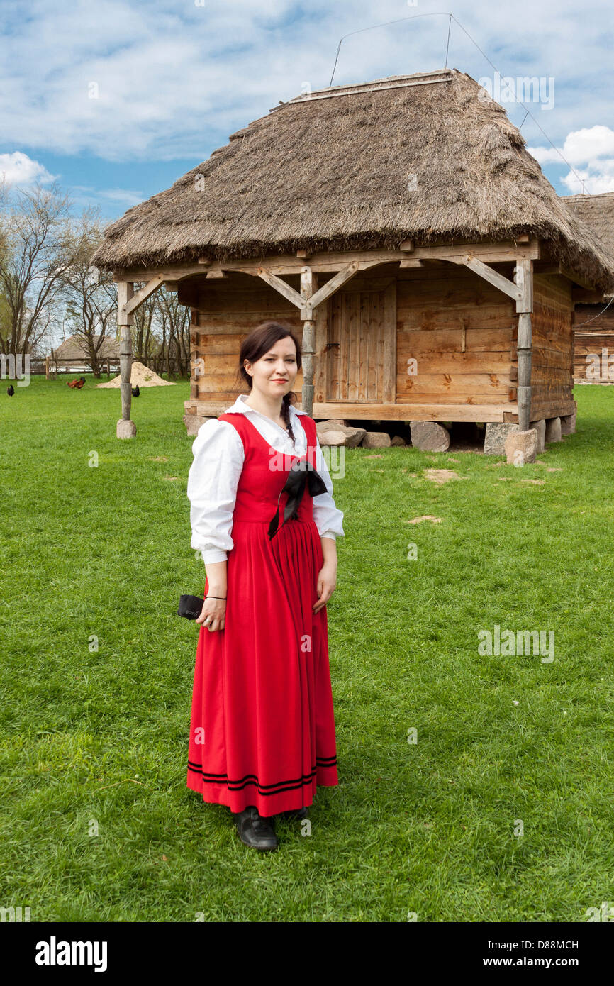Woman wearing traditional clothes in Museum of the Mazovian Countryside in Sierpc, Poland Stock Photo