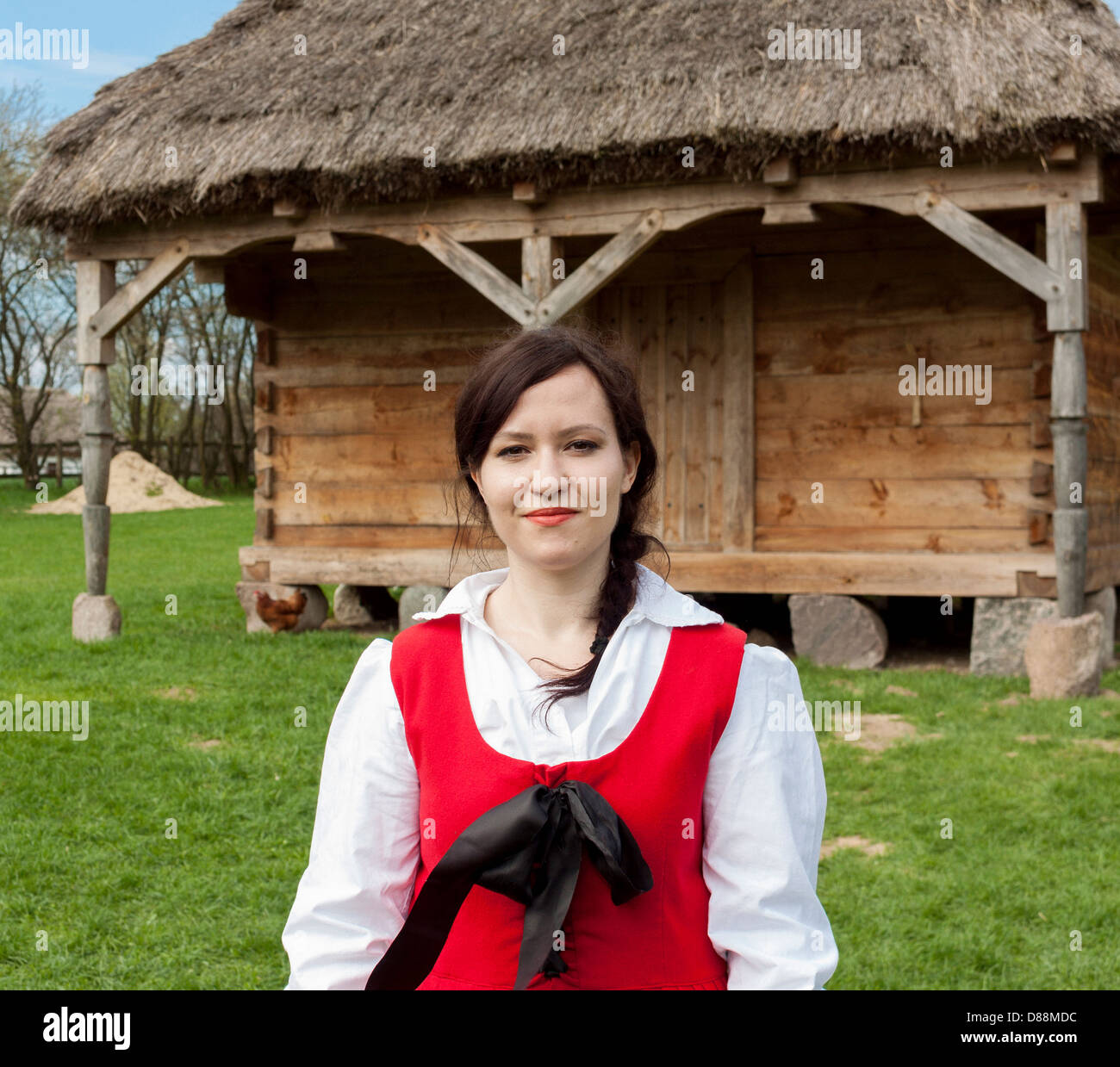Woman wearing traditional clothes in Museum of the Mazovian Countryside in Sierpc, Poland Stock Photo