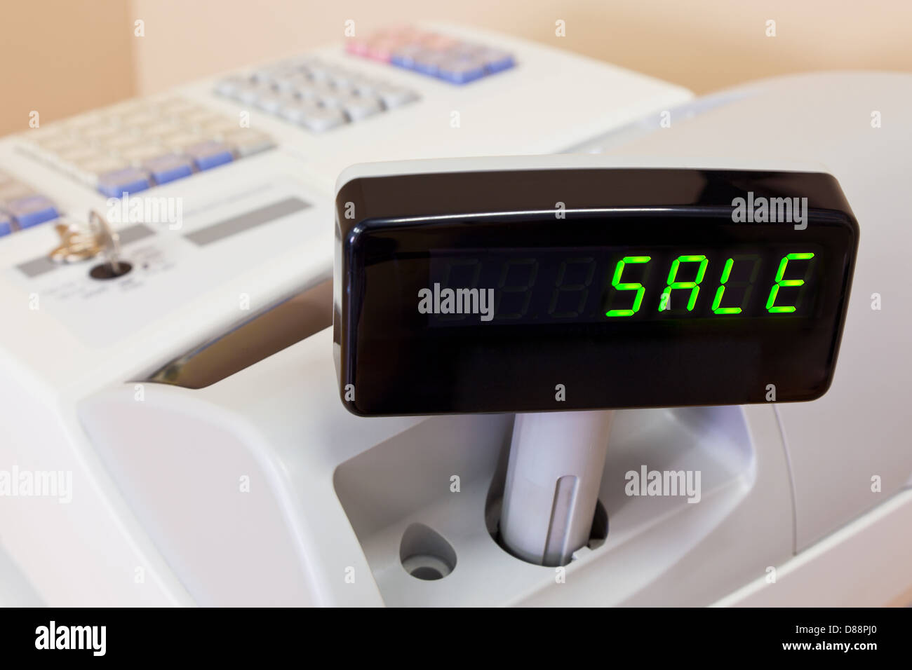 The word SALE on the display of a cash register Stock Photo