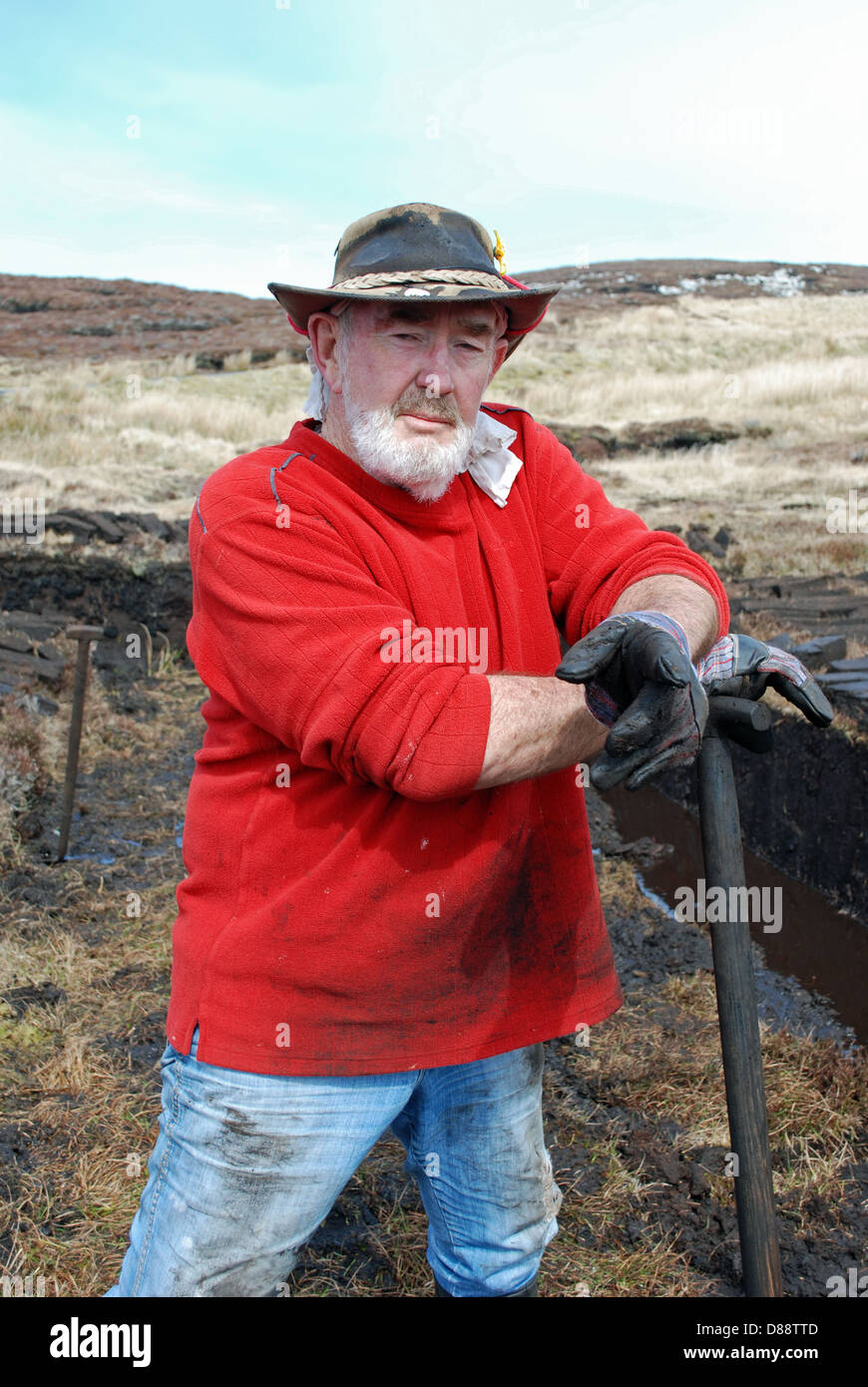 Turf cutter on Aranmore Island in Donegal. Stock Photo