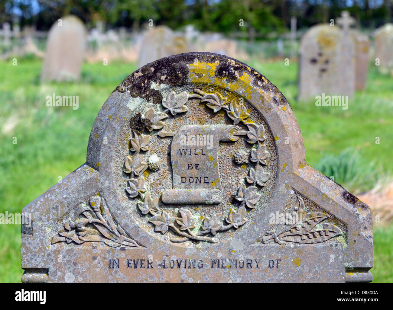 'THY WILL BE DONE', detail of gravestone. Church of All Saints. Frostenden, Suffolk, England, United Kingdom, Europe. Stock Photo