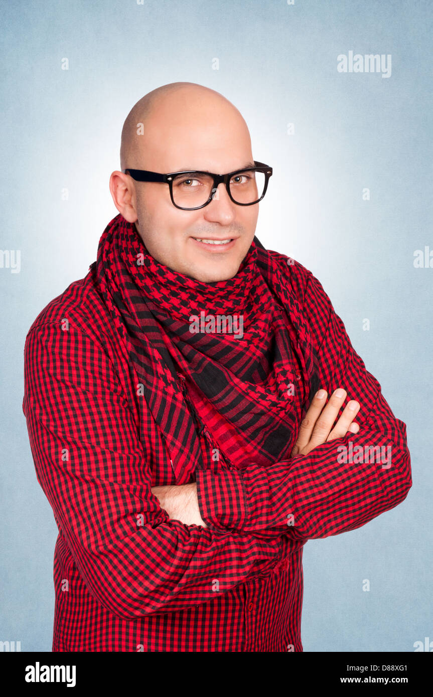 Man with crossing hands giving the smile Stock Photo Alamy