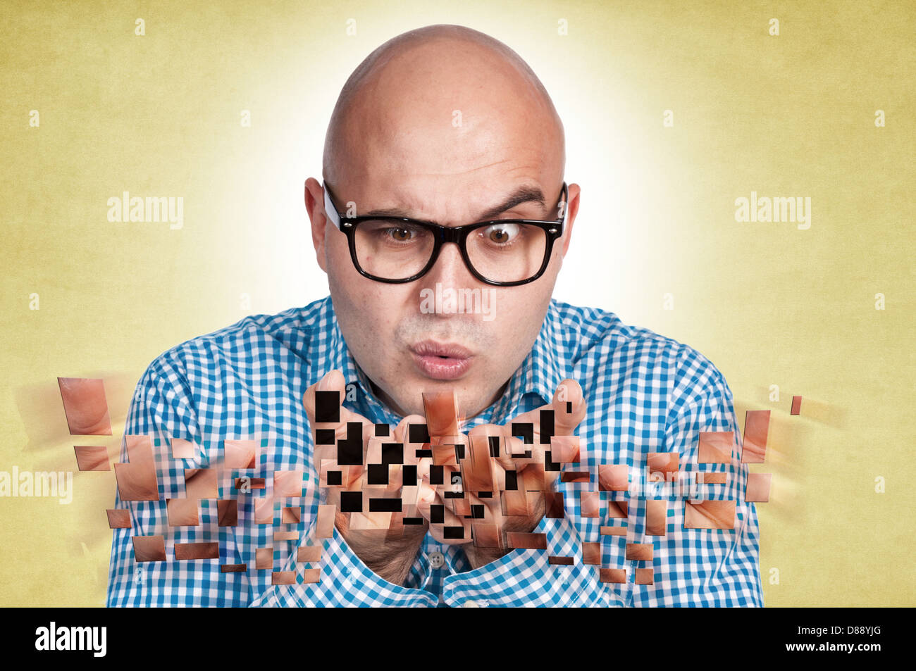Man blowing his hand Stock Photo Alamy