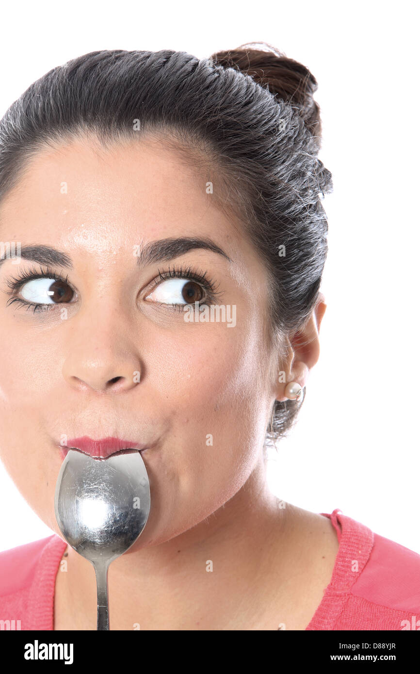 Woman sucking a spoon hi-res stock photography and images - Alamy