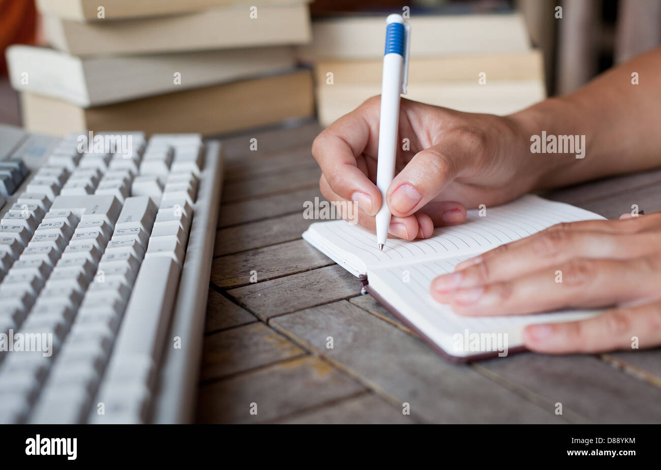 abstract hands writing in notepad, education Stock Photo - Alamy