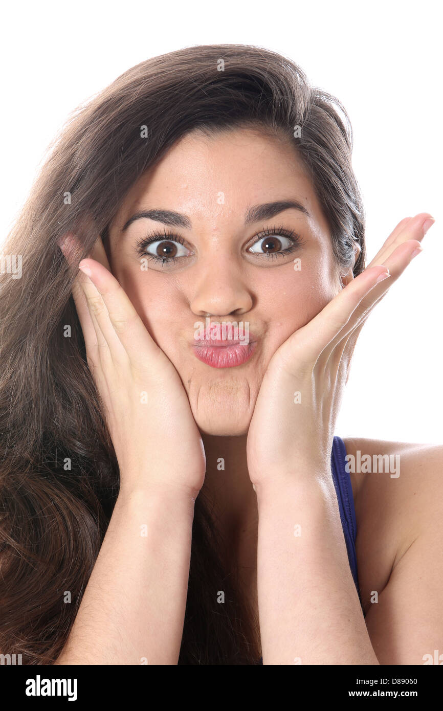 Model Released. Young Woman Pulling Faces Stock Photo