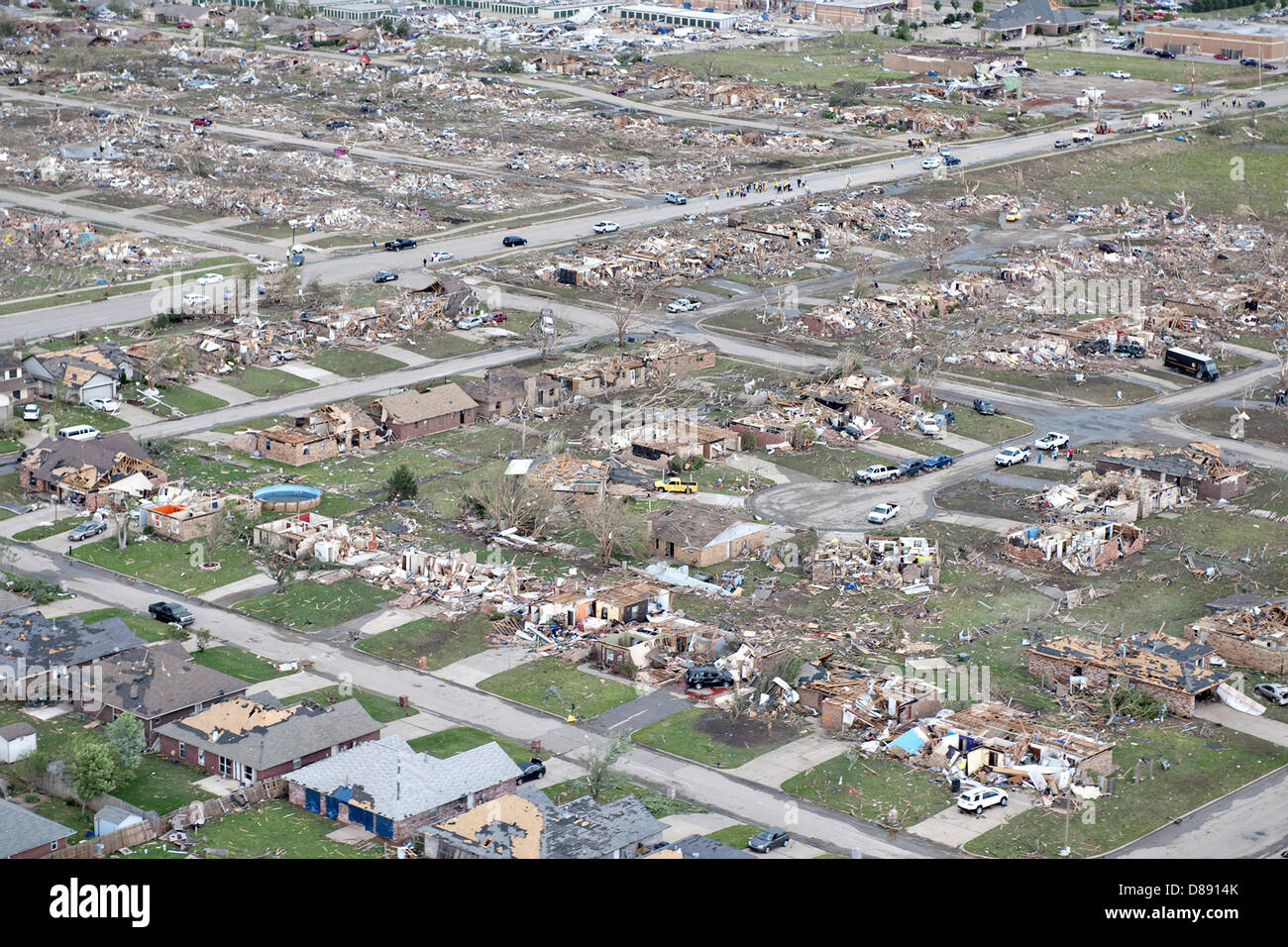 Aerial view of destruction from an EF-5 tornado May 21, 2013 in Moore, Oklahoma. The massive storm with winds exceeding 200 miles per hour tore through the Oklahoma City suburb May 20, 2013, killing at least 24 people, injuring more than 230 and displacing thousands. Stock Photo