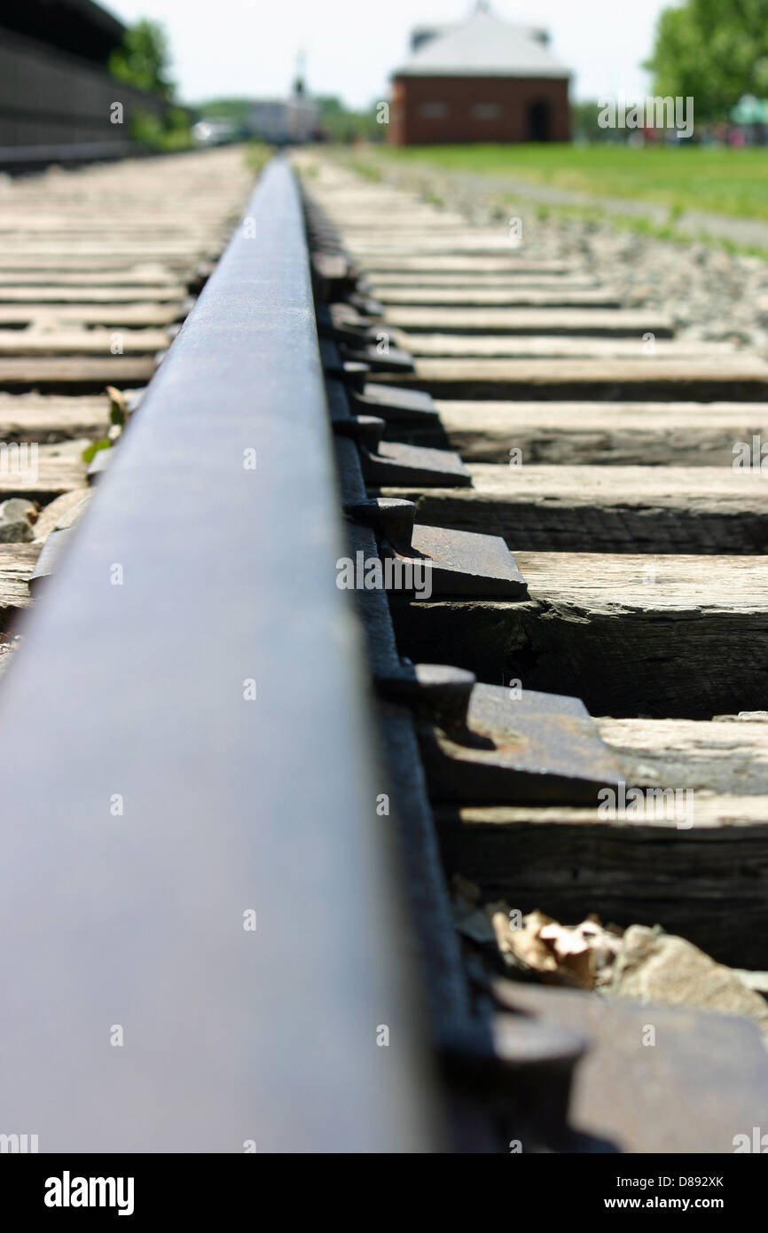 A single railroad track diminishing into the distance Stock Photo