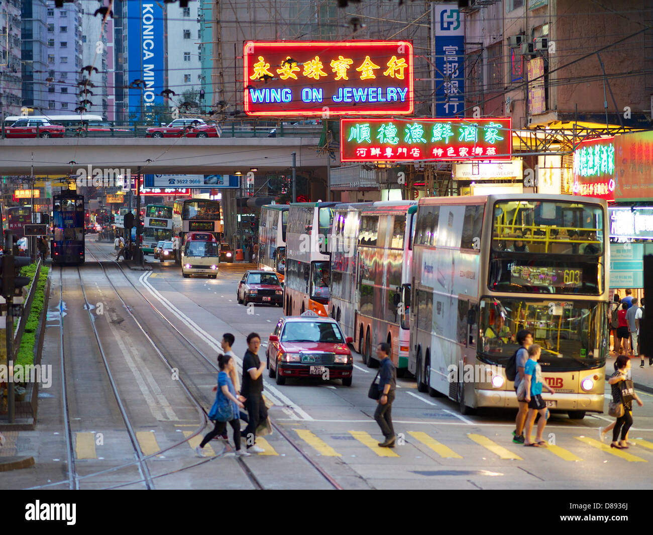 Late Saturday evening in Wan Chai, busy with shoppers and traffic Stock Photo