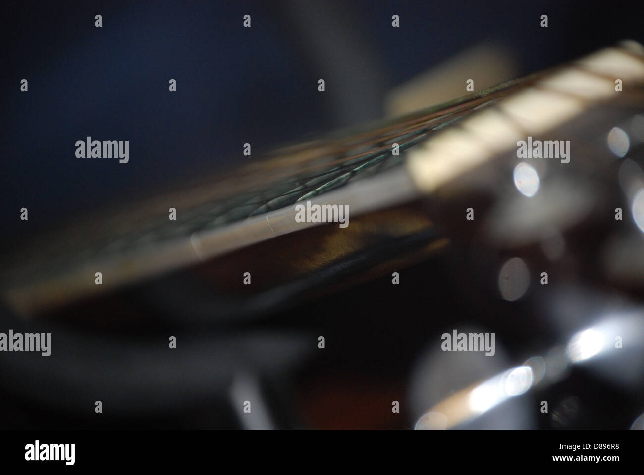 The neck of an acoustic guitar Stock Photo - Alamy