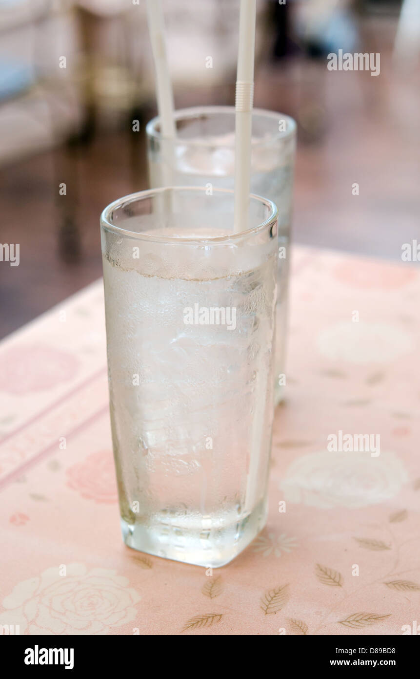two glass of water with ice on table Stock Photo