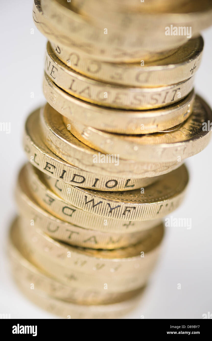A pile of pound coins on a table. Stock Photo