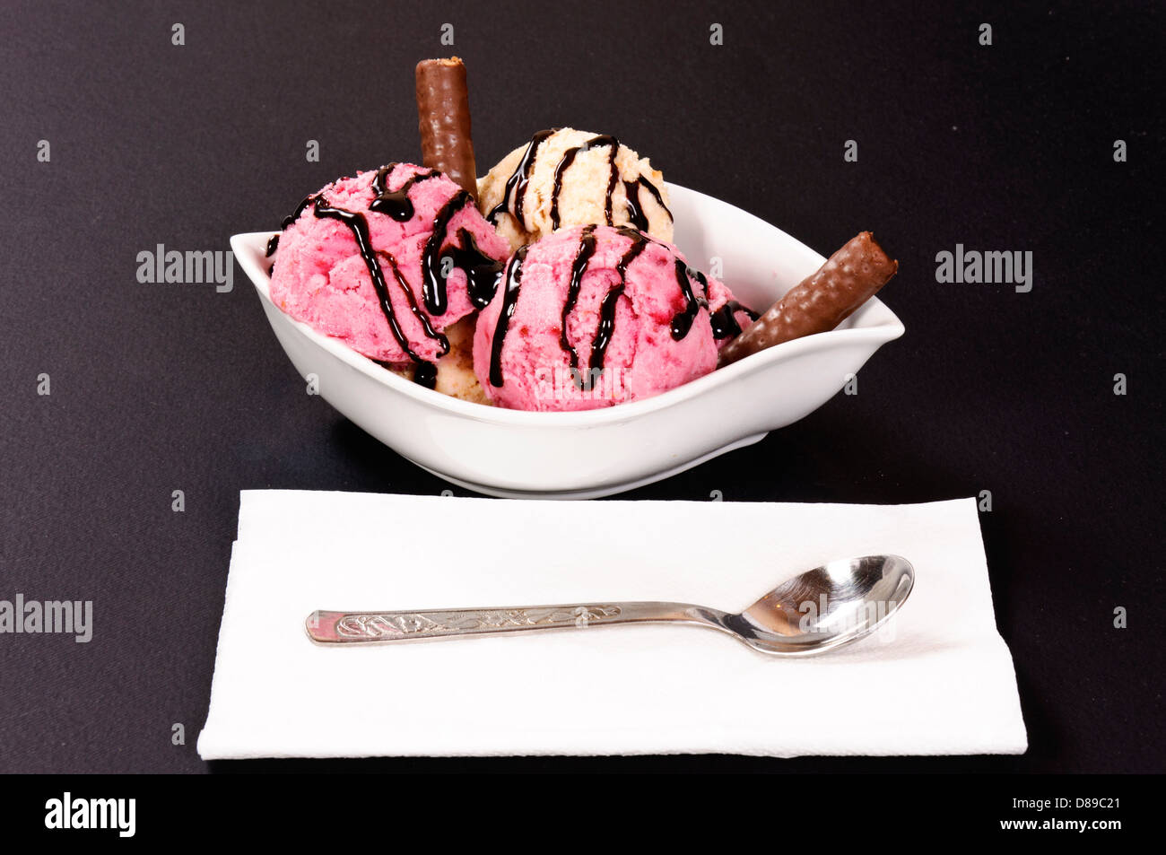 Ice cream bowl on black background Stock Photo - Alamy